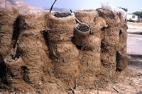 Advanced stage of mud-covered tyres